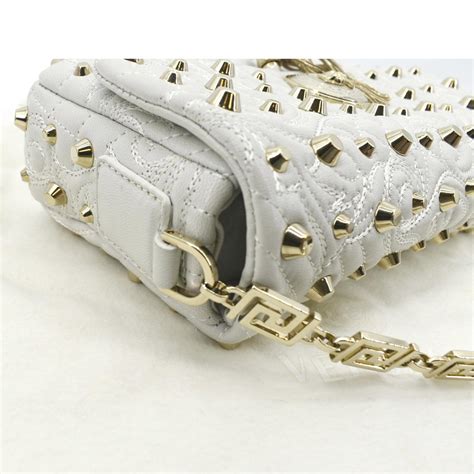 round versace studded vanitas medusa white tassel|Versace Studded Vanitas Medea White Tassel Bag.